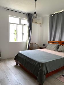 Postel nebo postele na pokoji v ubytování Namastay Appartment - La Gaulette, Near Le Morne