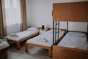 Posteľ alebo postele v izbe v ubytovaní Gościniec Celina