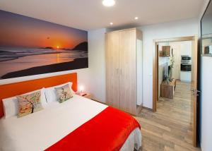 Postel nebo postele na pokoji v ubytování Apartamentos Lurralde