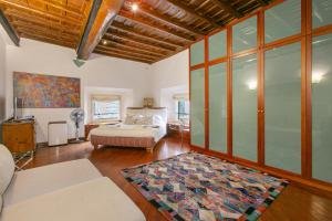 Voodi või voodid majutusasutuse Pantheon Palazzo Nari toas +62 fotot