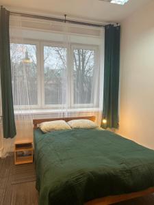 Posteľ alebo postele v izbe v ubytovaní Room in Old Town Krakow
