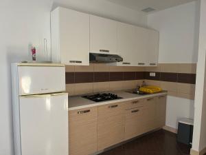 Küche/Küchenzeile in der Unterkunft Apartments Sun Rogoznica