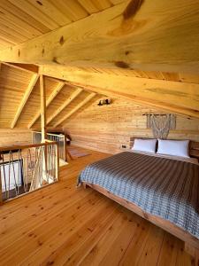 En eller flere senge i et værelse på Ordu Casa di Arte Bungalov