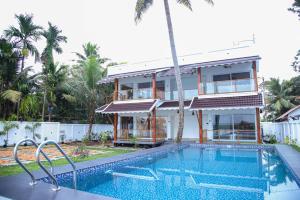 Πισίνα στο ή κοντά στο Kumarakom Sunview