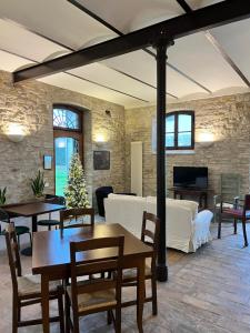 TV a/nebo společenská místnost v ubytování Agriturismo Podere La Fornace