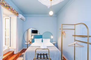 Ένα ή περισσότερα κρεβάτια σε δωμάτιο στο LR Guest House