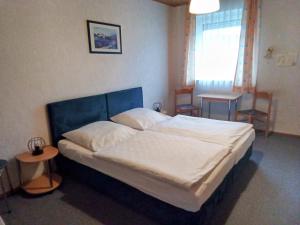 Postel nebo postele na pokoji v ubytování Gasthof zur Krone