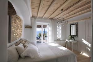 Postel nebo postele na pokoji v ubytování Villa Vanita Agios Ioannis Mykonos