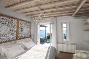 Postel nebo postele na pokoji v ubytování Villa Vanita Agios Ioannis Mykonos