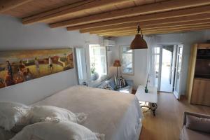 Postel nebo postele na pokoji v ubytování Villa Vanita Agios Ioannis Mykonos