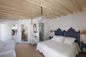 Postel nebo postele na pokoji v ubytování Villa Vanita Agios Ioannis Mykonos