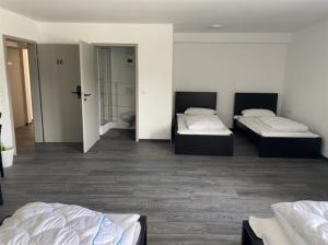 Ένα ή περισσότερα κρεβάτια σε δωμάτιο στο Ferienzimmer Nr 26