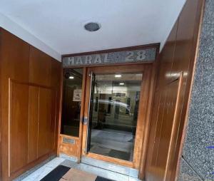 Muka bangunan atau pintu masuk Monoambiente centrico al frente en mardel