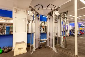 a gym with a row of gym equipment at NOA - Lüleci Hendek 54 in Istanbul +30 photos