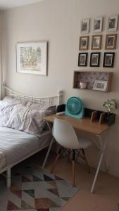 Ένα ή περισσότερα κρεβάτια σε δωμάτιο στο 8 Spatial 2BR Condo with Coffee Station +17 φωτογραφίες