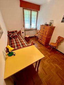 Postel nebo postele na pokoji v ubytování Appartamento sulle piste di Limone