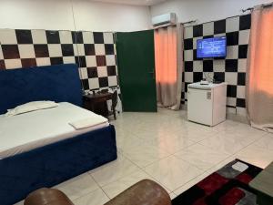 Postel nebo postele na pokoji v ubytování Motel Africa pas Chers