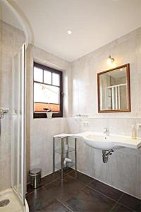 Koupelna v ubytování Urlaubstraeume-am-Meer-Wohnung-3-11-641