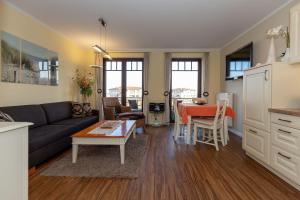 Kuchyň nebo kuchyňský kout v ubytování Urlaubstraeume-am-Meer-Wohnung-5-6-656