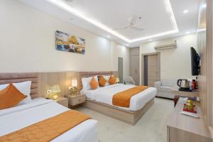 Hotel Sudarshan 객실 침대
