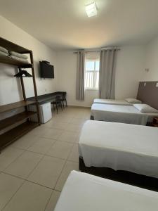 a room with two bunk beds and a pool table at Hotel Village Campinas in Campinas +54 photos