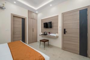 Hotel Sudarshan 객실 침대
