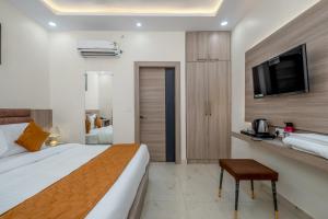 Hotel Sudarshan 객실 침대