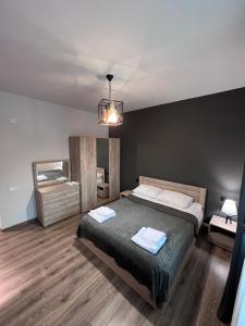 Ένα ή περισσότερα κρεβάτια σε δωμάτιο στο Regana Guest House Aghveran