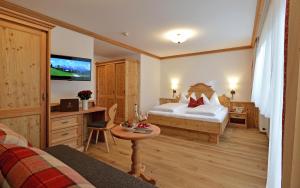Krevet ili kreveti u jedinici u okviru objekta Hotel Ritterhof Ellmau