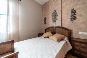 Ein Bett oder Betten in einem Zimmer der Unterkunft Casa el Rincón del Lago Alojamiento Rural