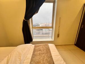 Postel nebo postele na pokoji v ubytování مصيف السعادة Masif ELsada