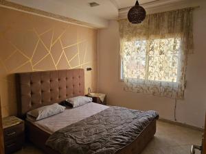 Postel nebo postele na pokoji v ubytování Résidence La Belle d'Orient