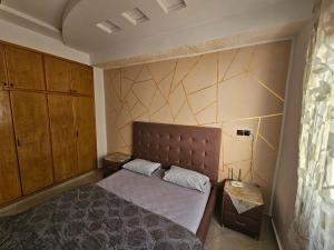 Postel nebo postele na pokoji v ubytování Résidence La Belle d'Orient
