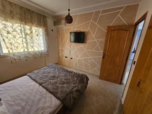 Postel nebo postele na pokoji v ubytování Résidence La Belle d'Orient