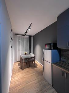 Η κουζίνα ή μικρή κουζίνα στο Regana Guest House Aghveran