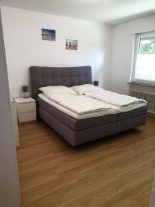 Postel nebo postele na pokoji v ubytování Wohnung 59