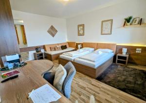 Postel nebo postele na pokoji v ubytování Aparthotel Neudörfl