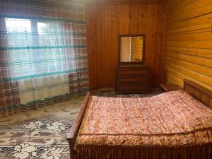 Katil atau katil-katil dalam bilik di Hill House
