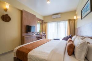 Llit o llits en una habitació de Hotel Haven O' Ganga 37 fotos més