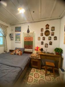 Postel nebo postele na pokoji v ubytování Soul PnB Homestay