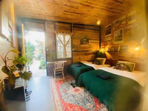 Postel nebo postele na pokoji v ubytování Soul PnB Homestay