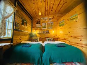 Postel nebo postele na pokoji v ubytování Soul PnB Homestay