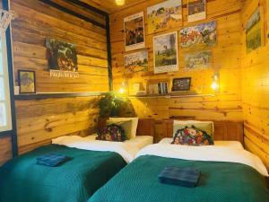Postel nebo postele na pokoji v ubytování Soul PnB Homestay