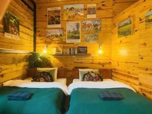 Postel nebo postele na pokoji v ubytování Soul PnB Homestay