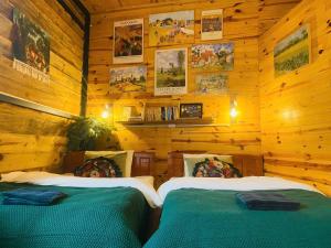 Postel nebo postele na pokoji v ubytování Soul PnB Homestay