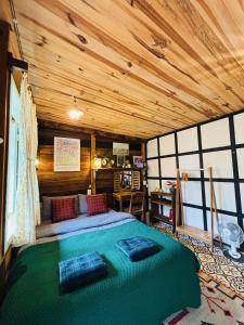 Postel nebo postele na pokoji v ubytování Soul PnB Homestay