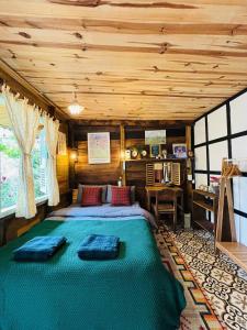 Postel nebo postele na pokoji v ubytování Soul PnB Homestay