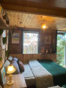 Postel nebo postele na pokoji v ubytování Soul PnB Homestay