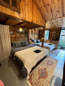 Postel nebo postele na pokoji v ubytování Soul PnB Homestay