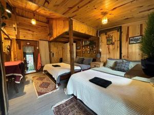Postel nebo postele na pokoji v ubytování Soul PnB Homestay